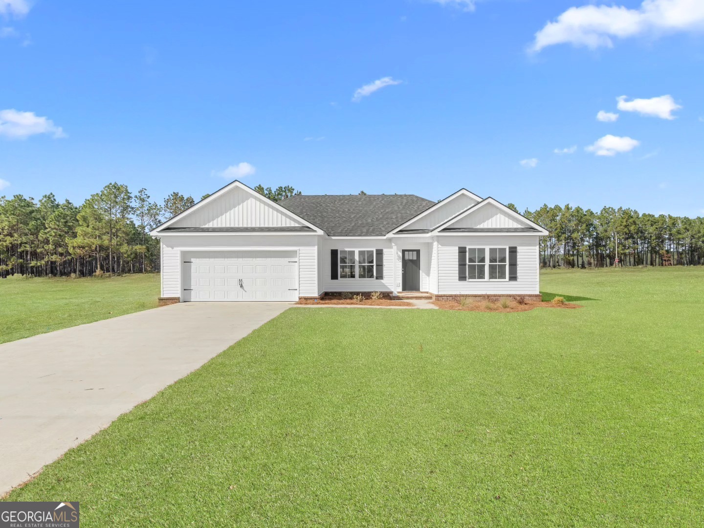 2075 Old Register Road Statesboro, GA 30458 - Photo 5 of 11 a view of house with garden and trees