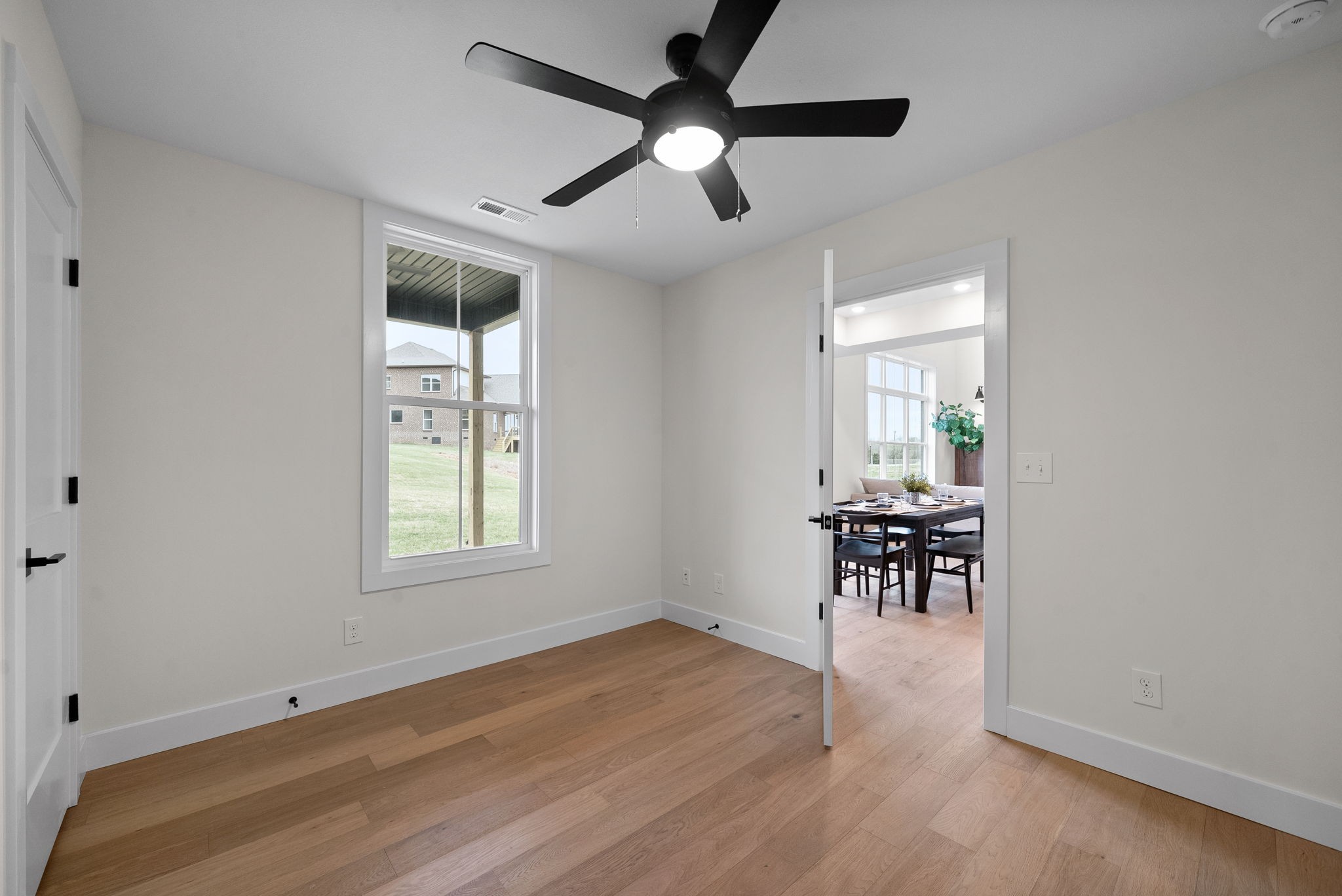 15 Rustling Oaks Court Pleasant View, TN 37146 - Photo 22 of 50 wooden floor in an empty room with a window