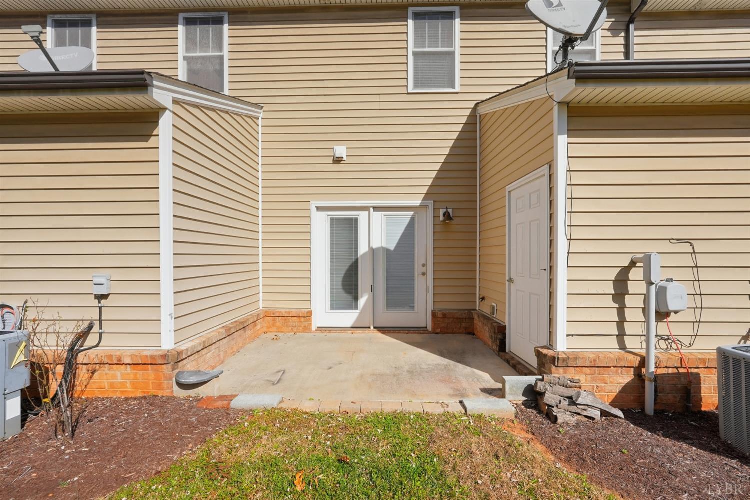 1057 Casley Way Forest, VA 24551 - Photo 22 of 27 a backyard of a house with yard and seating space