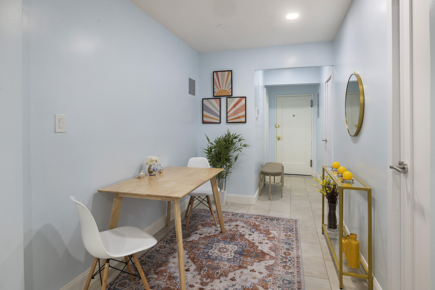 25 Indian Road, Unit 2A Manhattan, NY 10034 - Photo 4 of 11 a view of a dining room with furniture and wooden floor