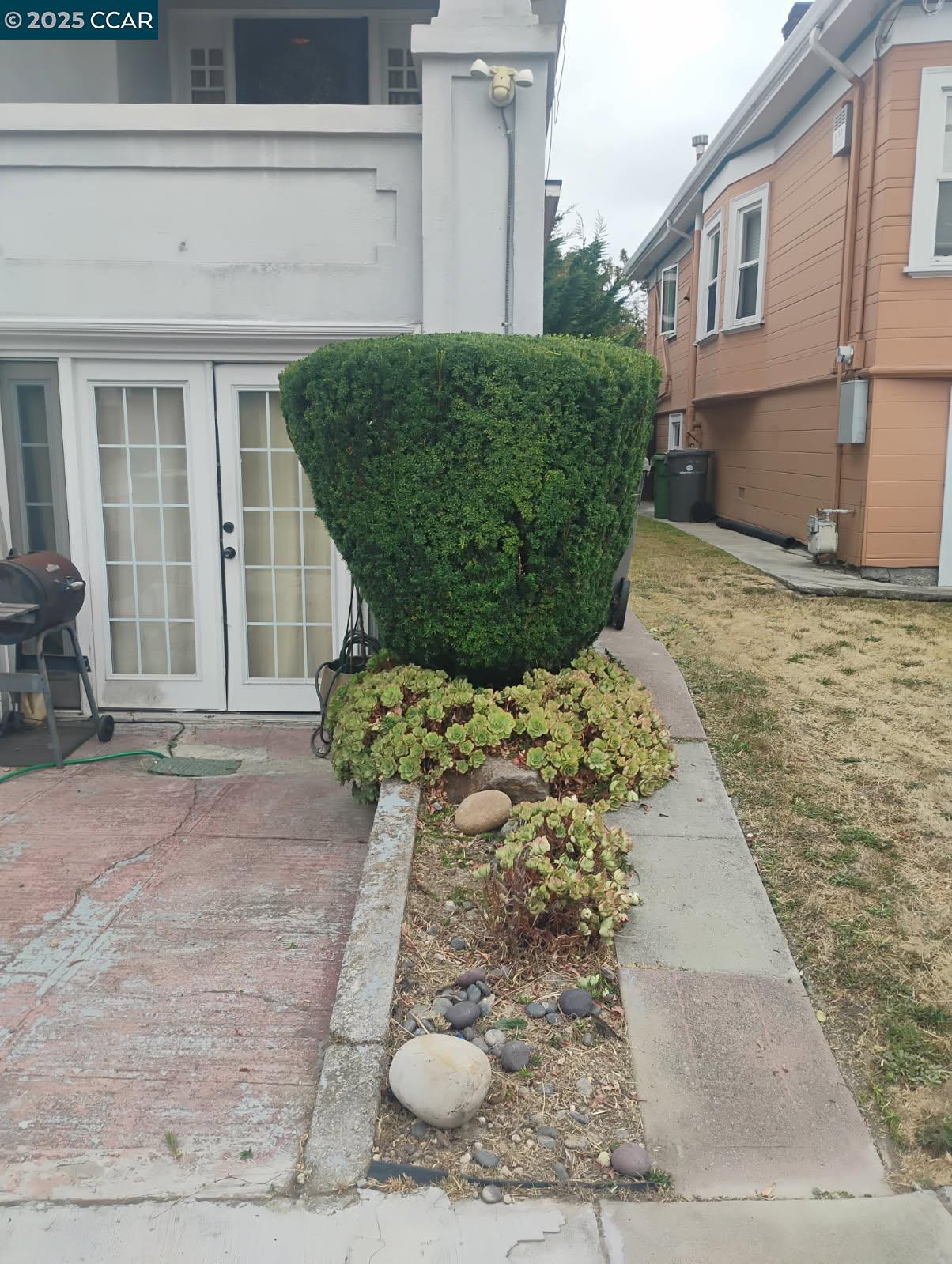 1161 64th Street Oakland, CA 94608 - Photo 12 of 34 a view of a backyard