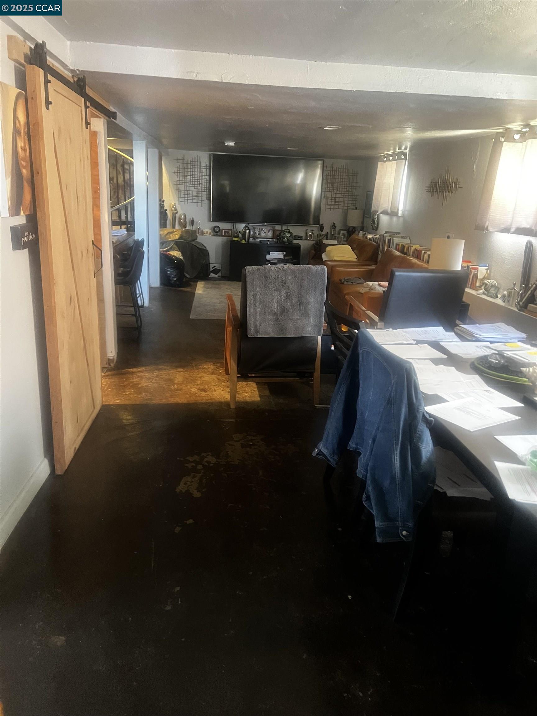 1161 64th Street Oakland, CA 94608 - Photo 23 of 34 a view of a lobby with furniture and floor to ceiling window