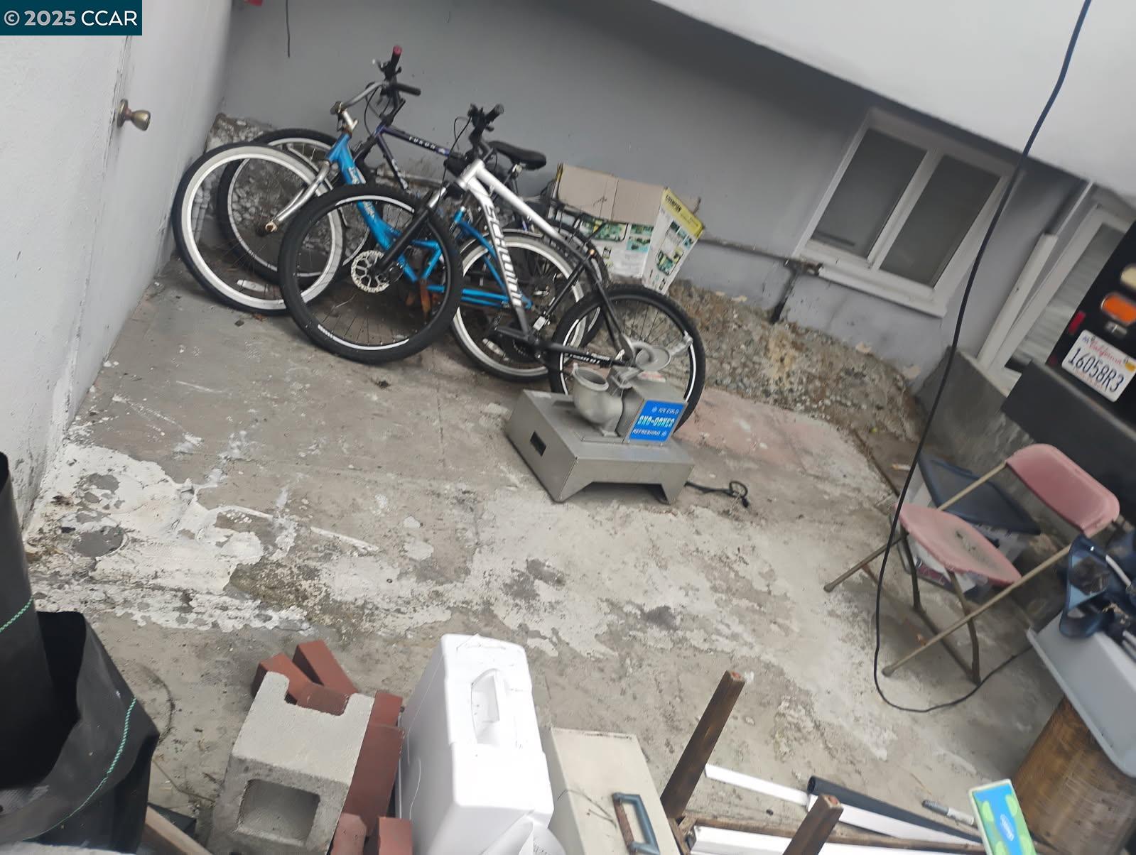 1161 64th Street Oakland, CA 94608 - Photo 9 of 34 a view of a room with gym equipment