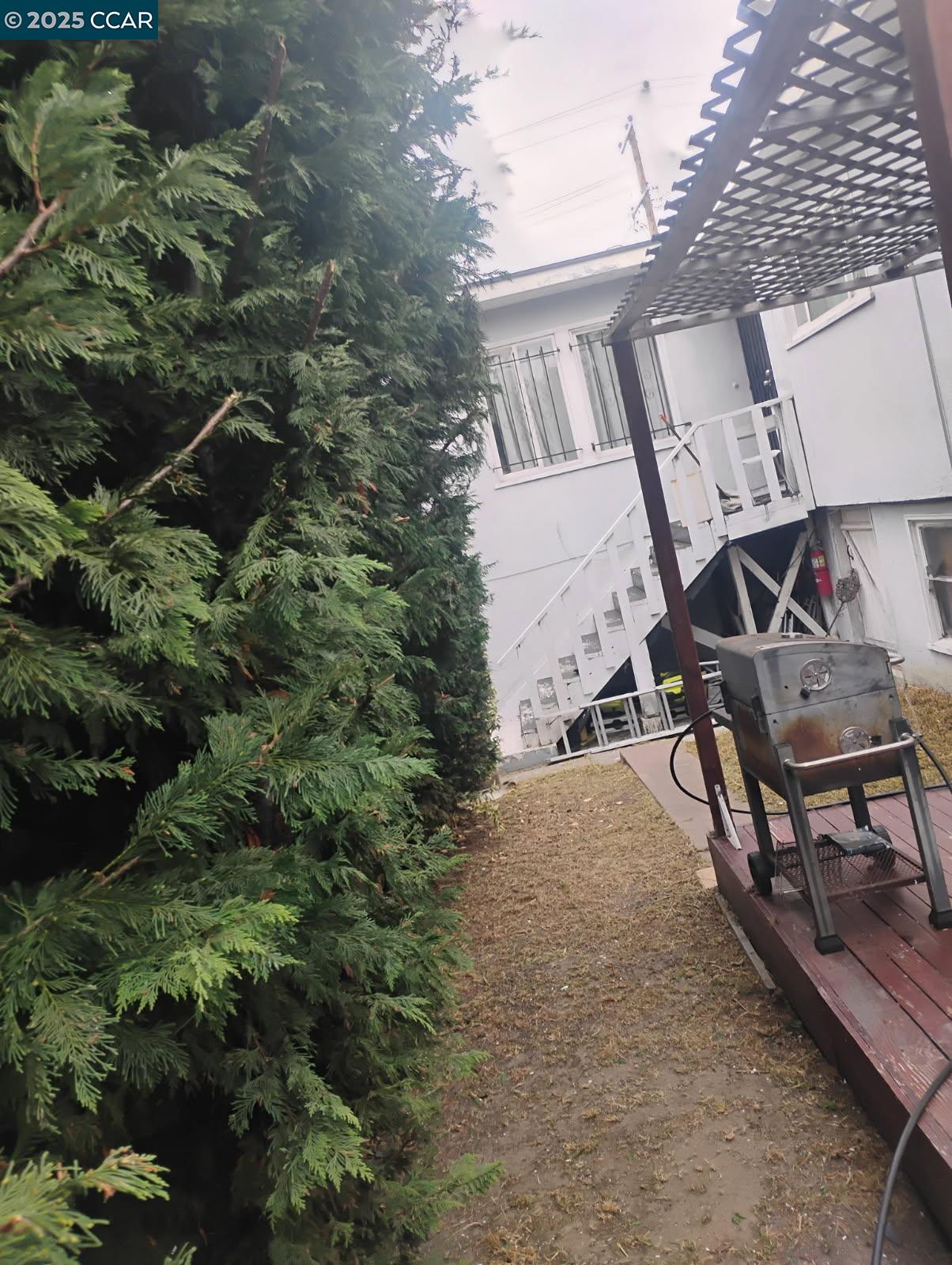 1161 64th Street Oakland, CA 94608 - Photo 10 of 34 a view of an outdoor space with seating area