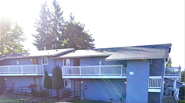 a view of a house with a roof deck
