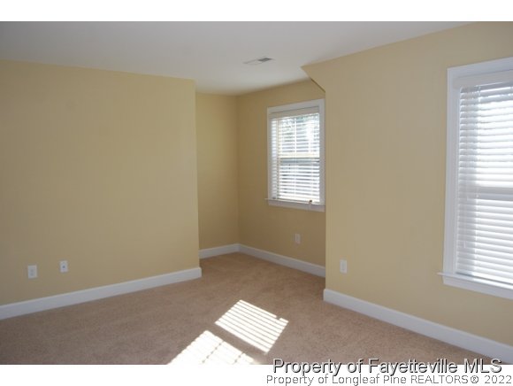1014 Micahs Way North Spring Lake, NC 28390 - Photo 14 of 25 a view of an empty room and window