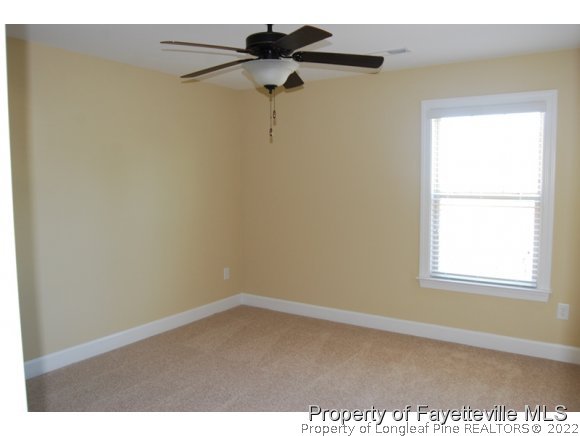 1014 Micahs Way North Spring Lake, NC 28390 - Photo 15 of 25 a view of an empty room and a window