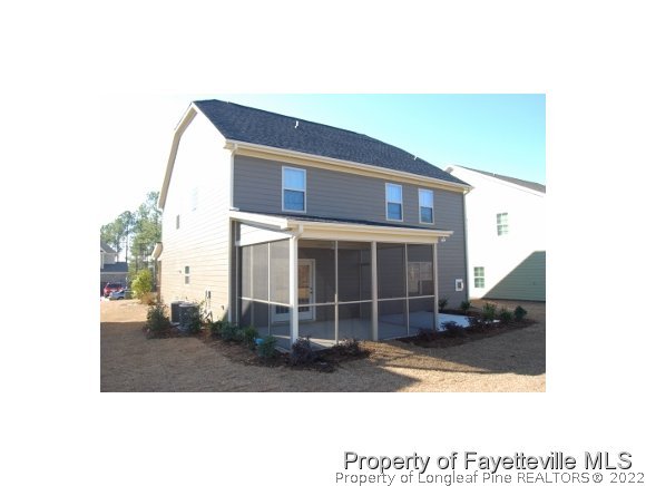 1014 Micahs Way North Spring Lake, NC 28390 - Photo 2 of 25 a view of a house with a backyard
