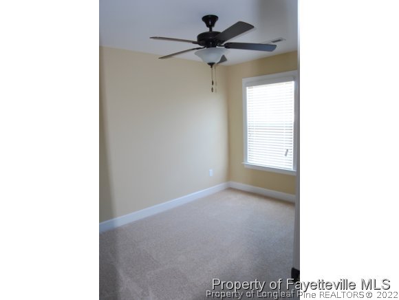 1014 Micahs Way North Spring Lake, NC 28390 - Photo 21 of 25 a view of an empty room with a window