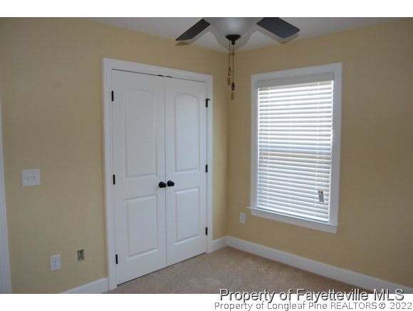 1014 Micahs Way North Spring Lake, NC 28390 - Photo 22 of 25 a view of an empty room and window