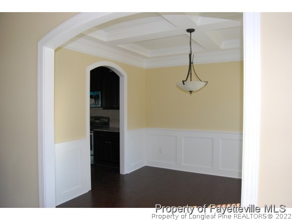 1014 Micahs Way North Spring Lake, NC 28390 - Photo 4 of 25 a view of a hallway with wooden floor