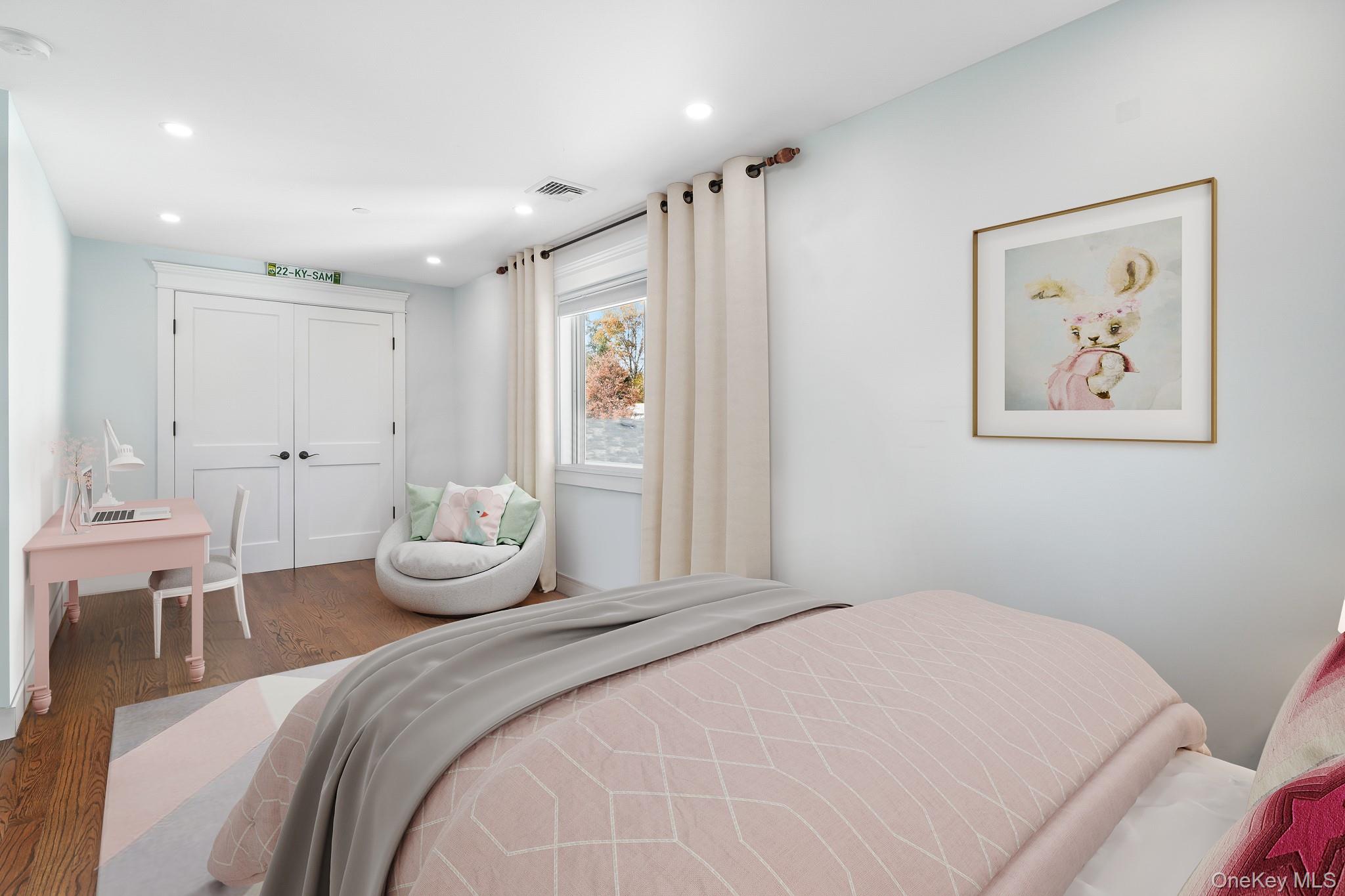 16 Bramblebrook Road Ardsley, NY 10502 - Photo 25 of 32 a bedroom with a bed and painting on the wall