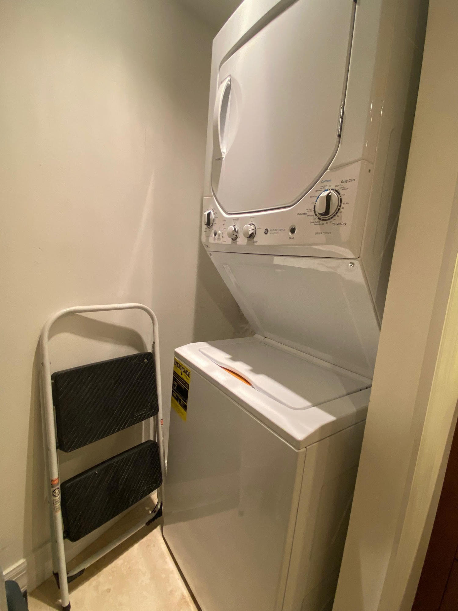 3000 North Ocean Drive, Unit 6B Singer Island, FL 33404 - Photo 12 of 47 a utility room with dryer and washer