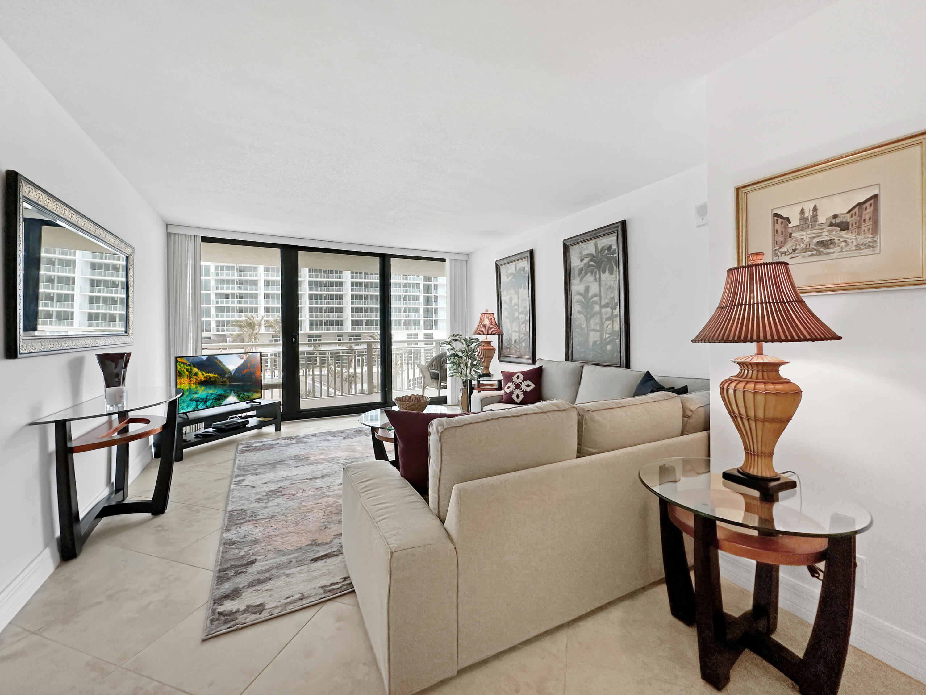 3000 North Ocean Drive, Unit 6B Singer Island, FL 33404 - Photo 6 of 47 a living room with furniture and a window