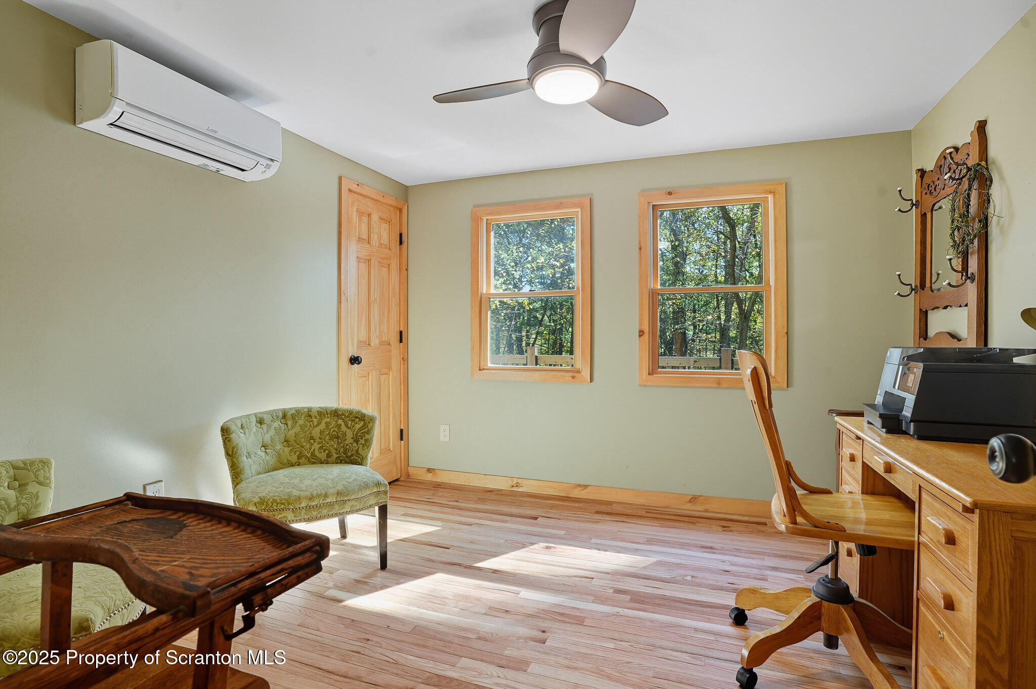 452 Engvaldsen Road Hawley, PA 18428 - Photo 19 of 42 a workspace with wooden floor and a window