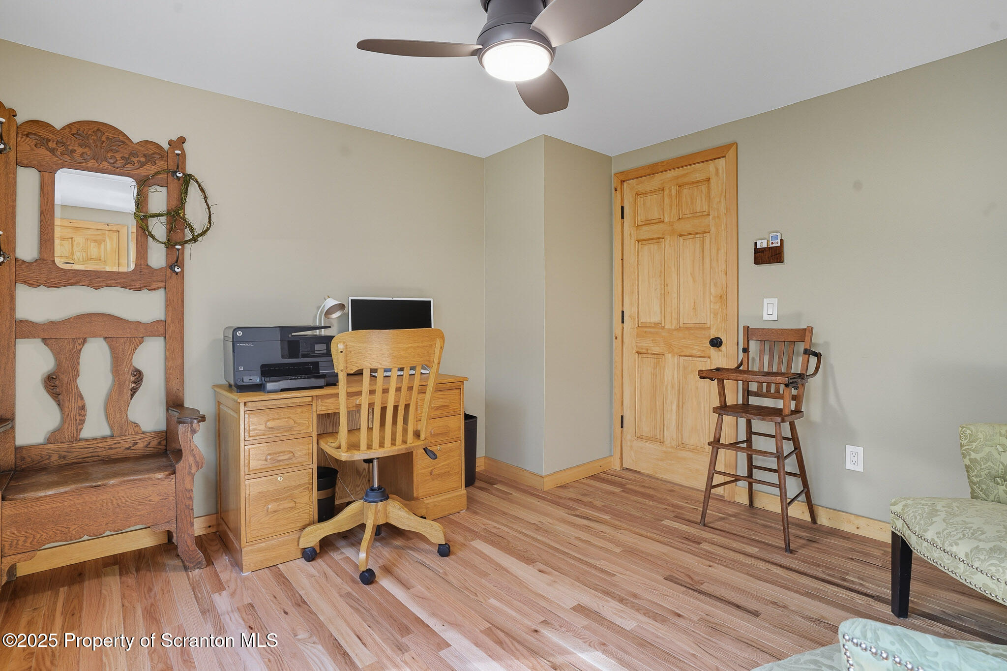 452 Engvaldsen Road Hawley, PA 18428 - Photo 20 of 42 a view of a workspace with furniture and wooden floor