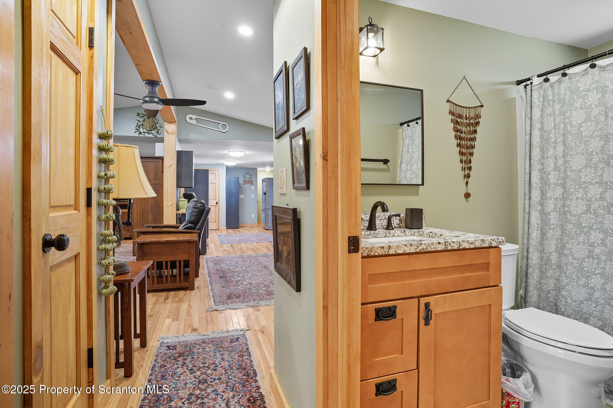 452 Engvaldsen Road Hawley, PA 18428 - Photo 21 of 42 a bathroom with a granite countertop sink toilet and shower