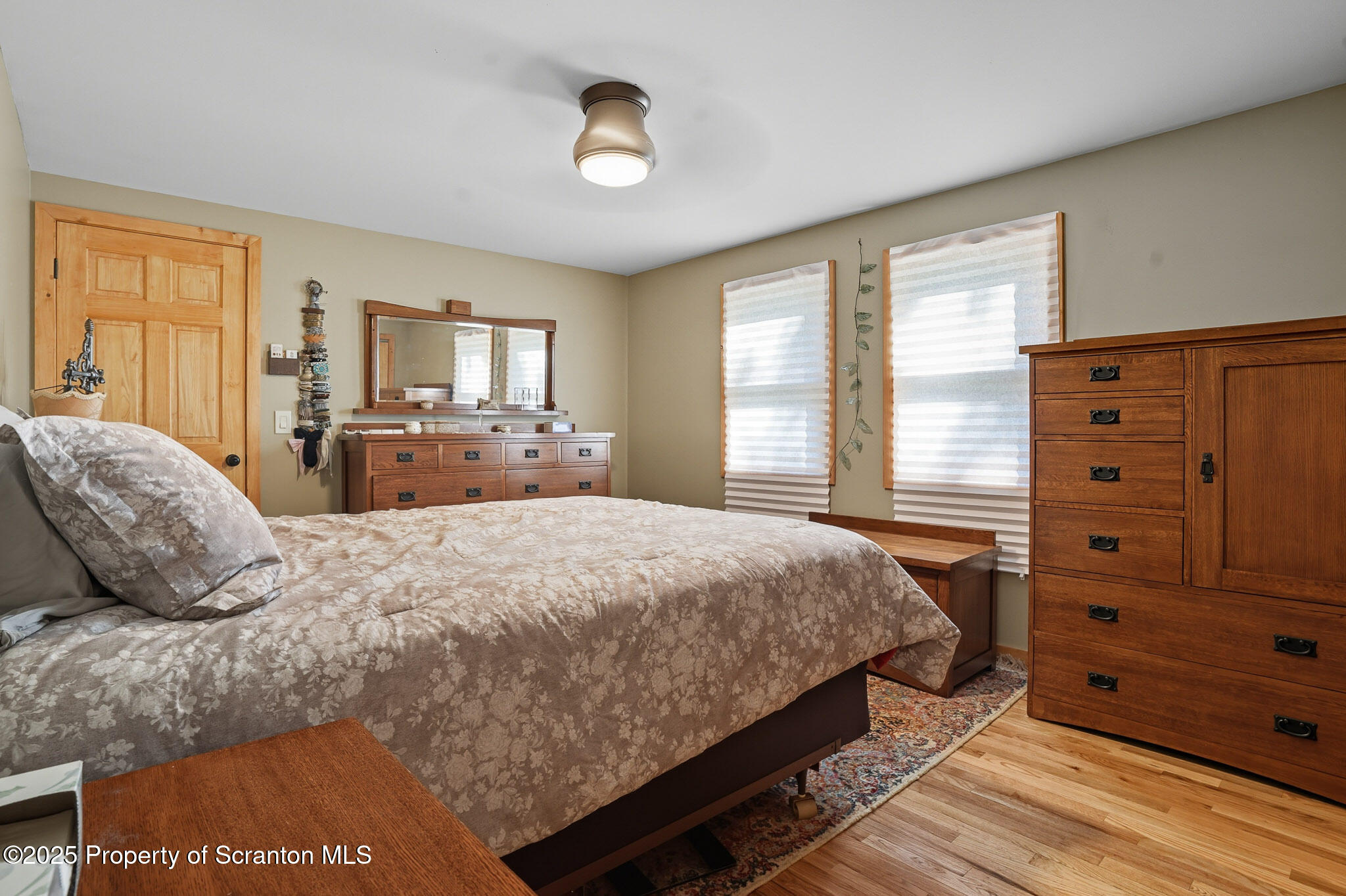 452 Engvaldsen Road Hawley, PA 18428 - Photo 24 of 42 a bedroom with a bed and window
