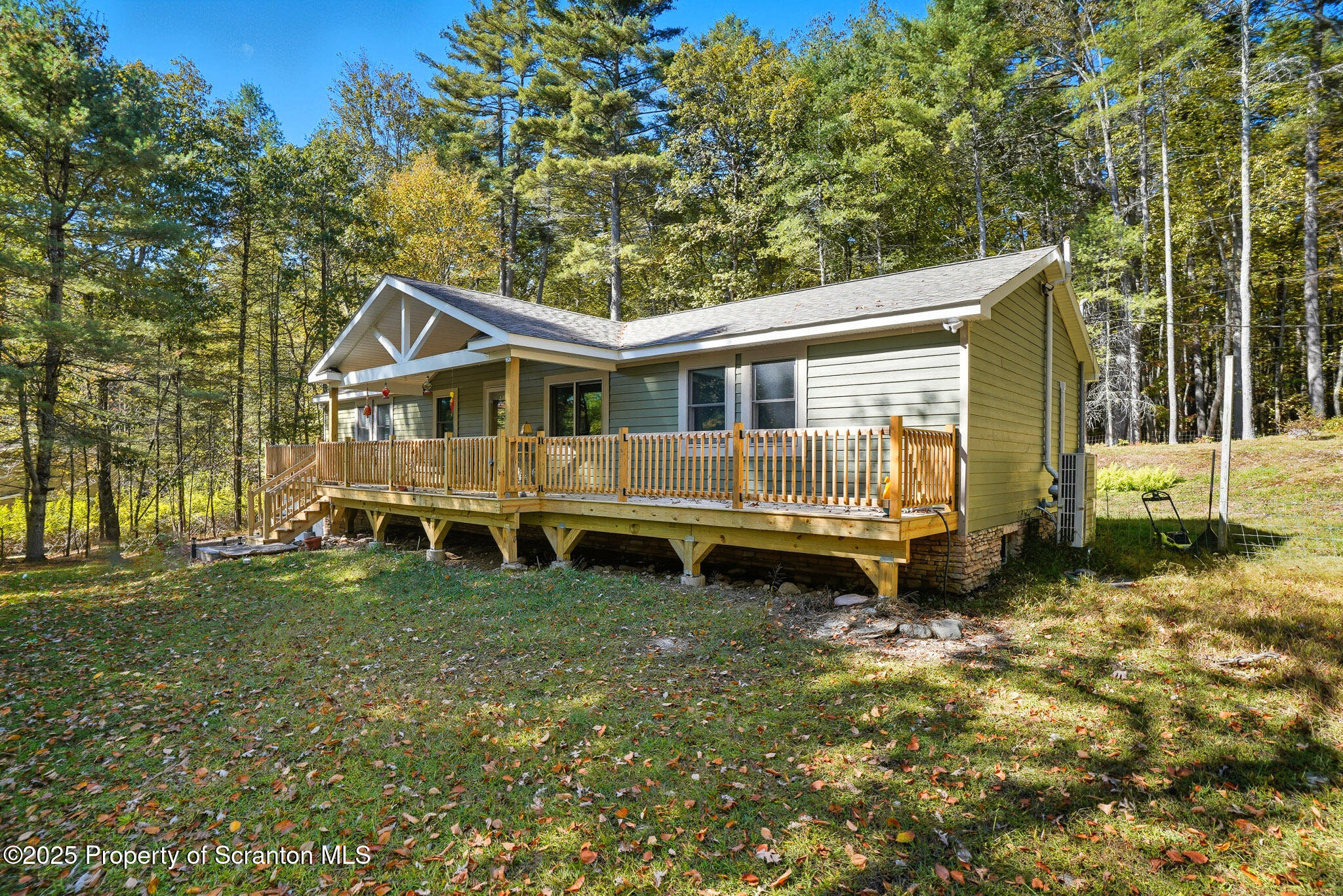 452 Engvaldsen Road Hawley, PA 18428 - Photo 31 of 42 a view of a house with a yard