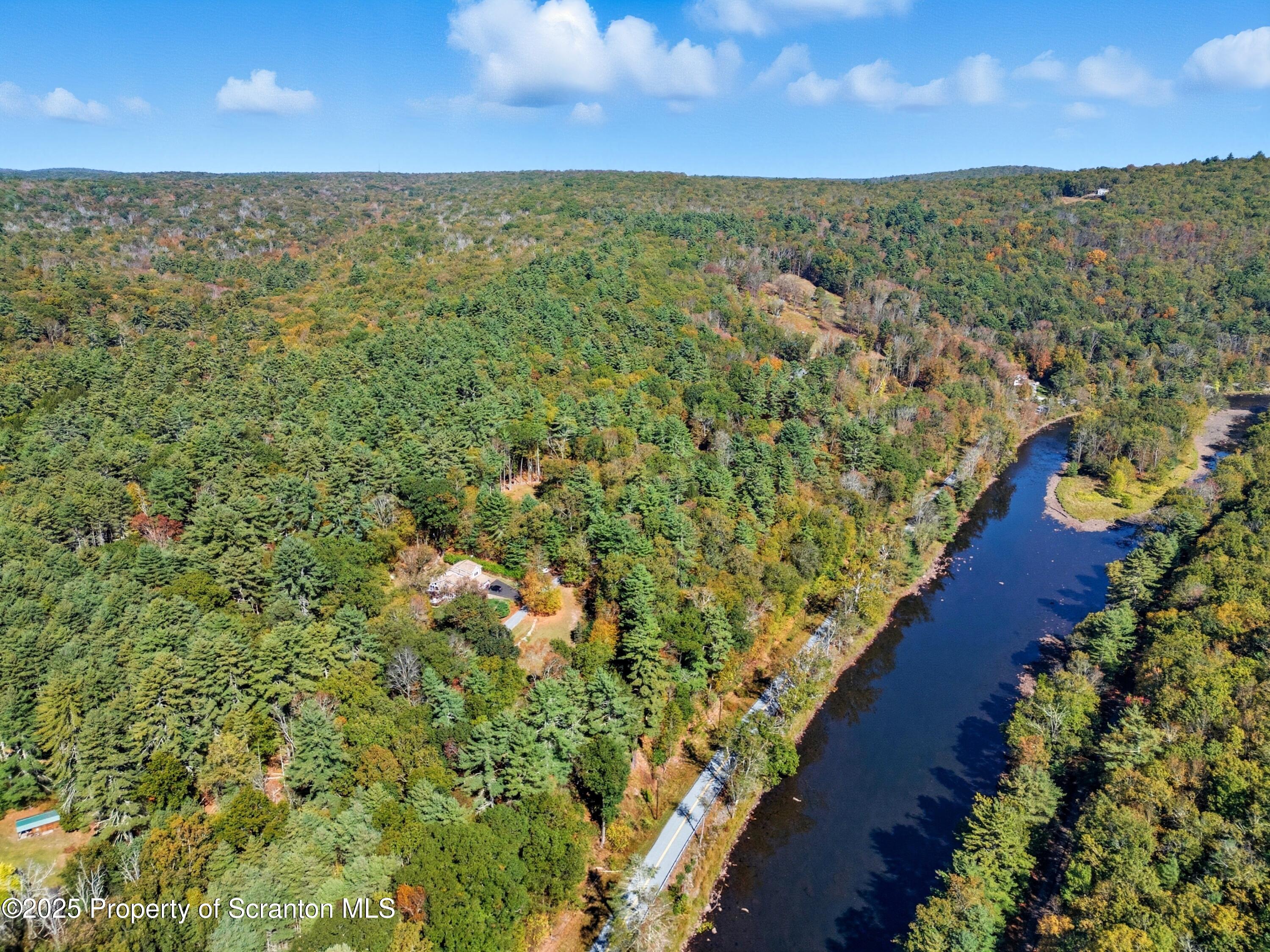 452 Engvaldsen Road Hawley, PA 18428 - Photo 37 of 42 a view of an outdoor space and a yard