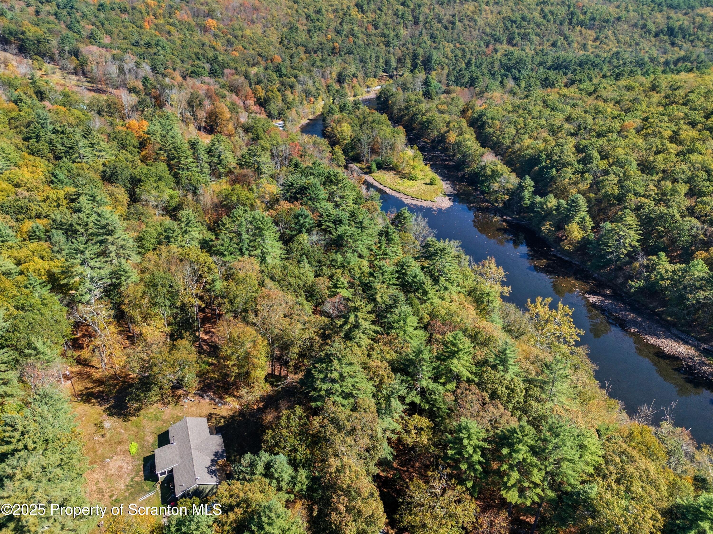 452 Engvaldsen Road Hawley, PA 18428 - Photo 39 of 42 an aerial view of a houses with a yard