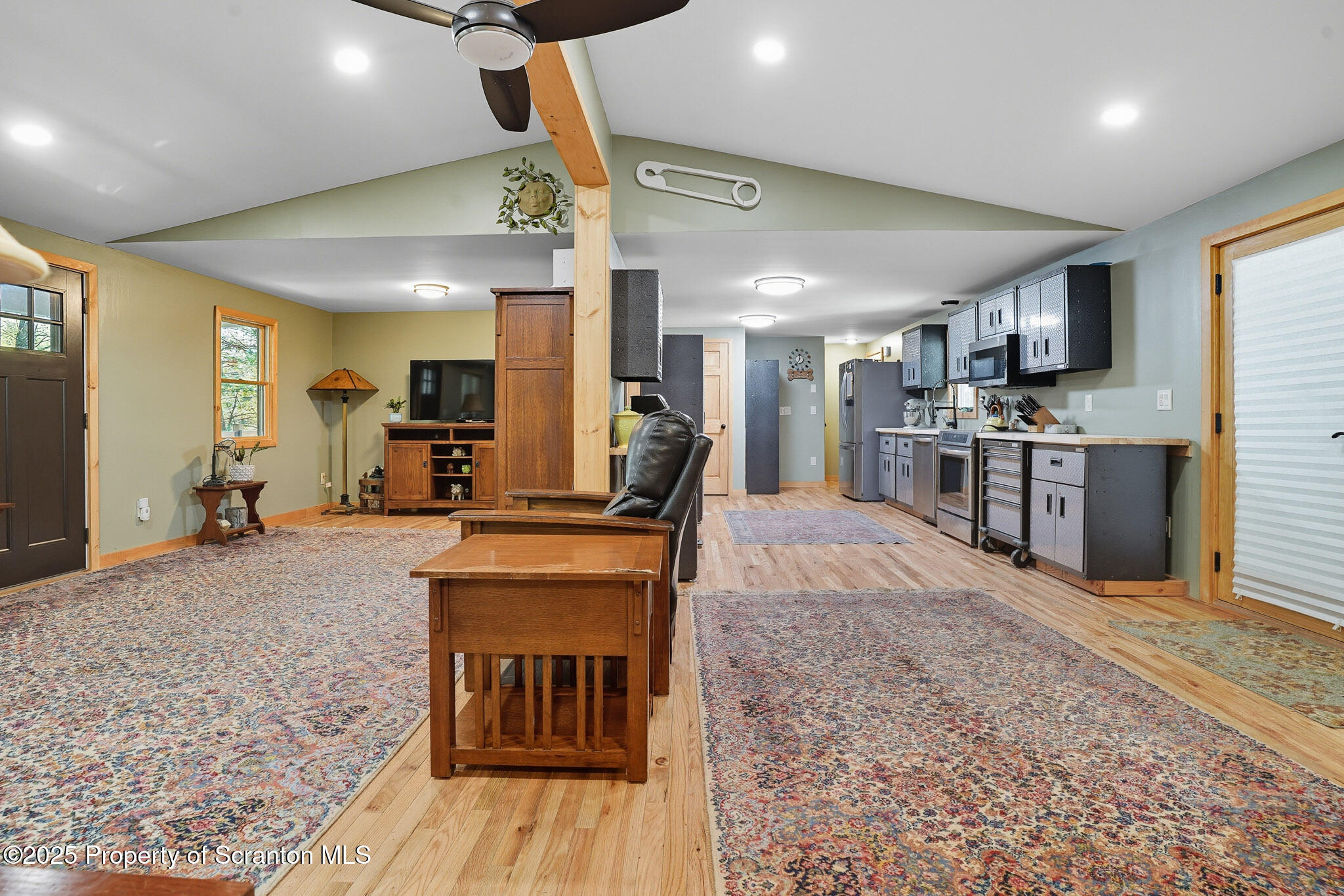 452 Engvaldsen Road Hawley, PA 18428 - Photo 8 of 42 a large kitchen with a table and chairs