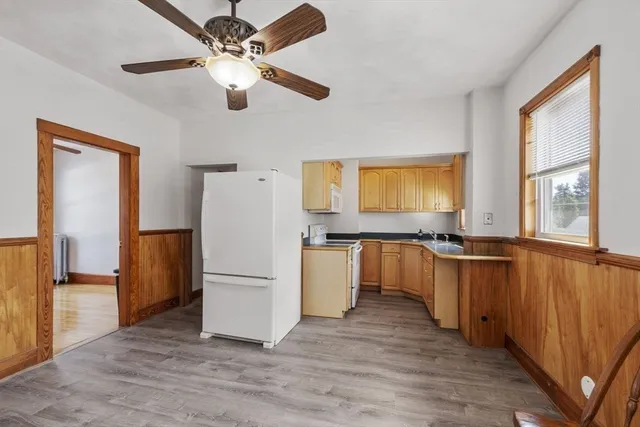 a kitchen with a refrigerator a sink and dishwasher