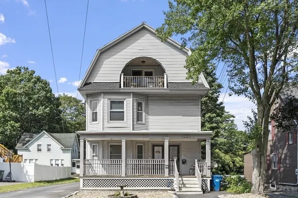 a white building with a large windows