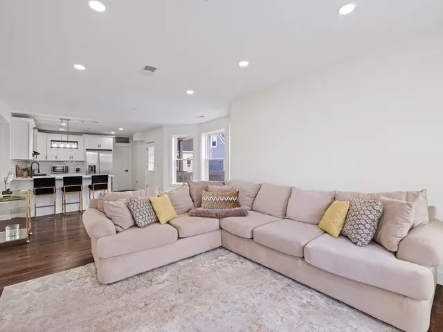 a living room with furniture and a couch