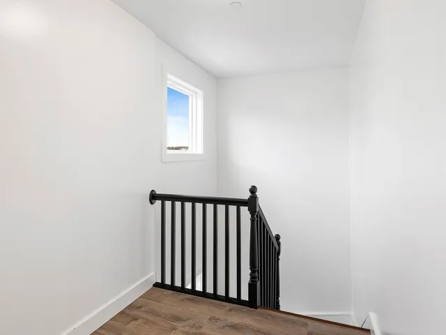 a kitchen with stainless steel appliances kitchen island granite countertop a sink and cabinets