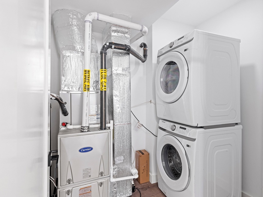 11 Seymour Avenue, Unit 3 Lynn, MA 01902 - Photo 36 of 38 a utility room with dryer and washer