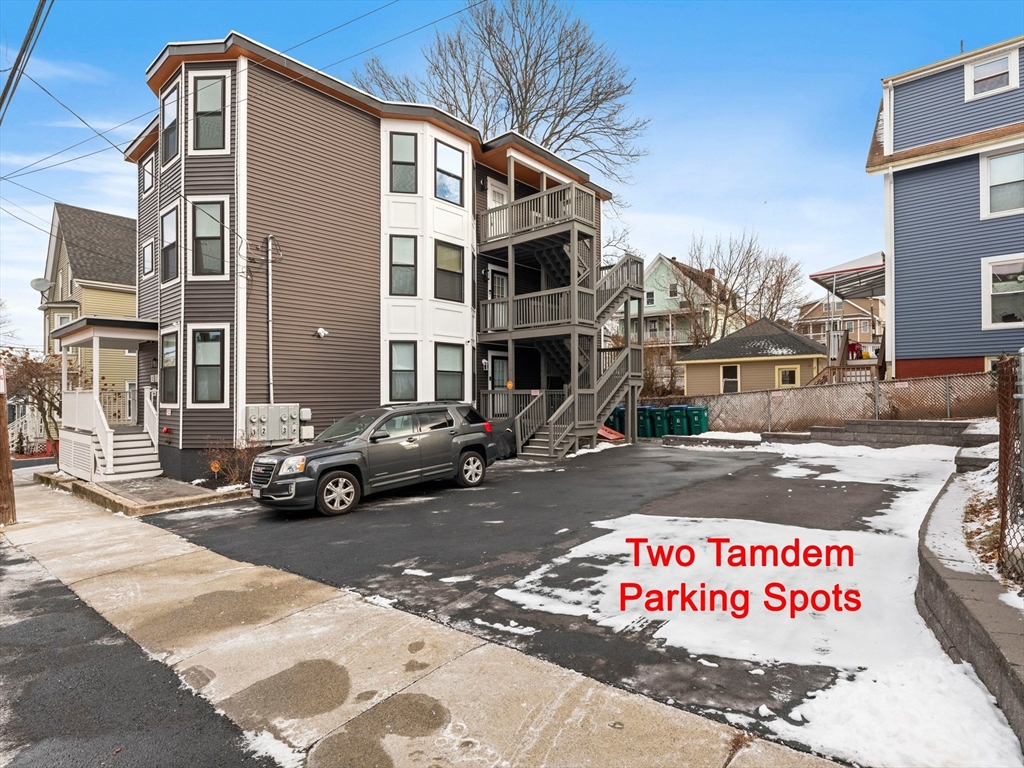 11 Seymour Avenue, Unit 3 Lynn, MA 01902 - Photo 4 of 38 a view of a street with a building in the background
