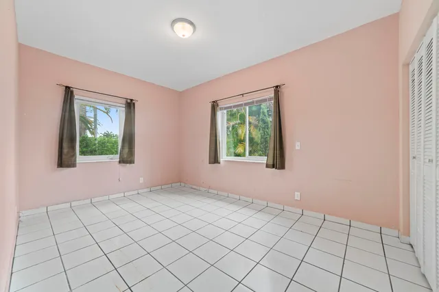 an empty room with windows