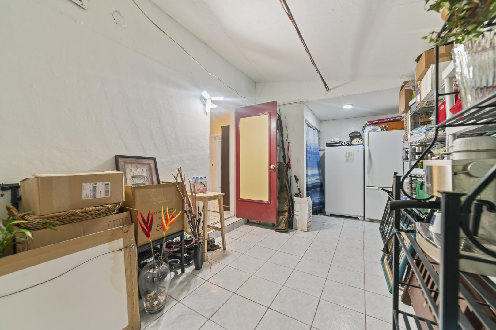 906 Northeast 5th Street Hallandale Beach, FL 33009 - Photo 24 of 35 a view of a room with gym equipment