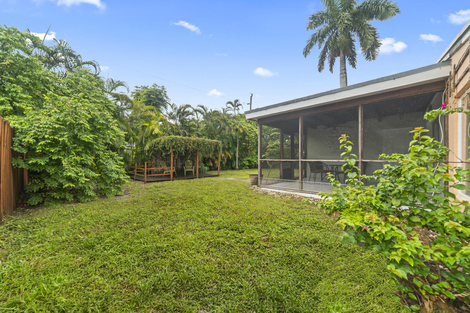 906 Northeast 5th Street Hallandale Beach, FL 33009 - Photo 31 of 35 a front view of house with yard and green space
