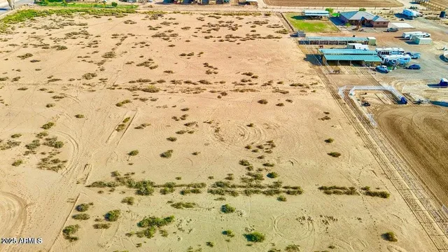 a view of a park with chairs