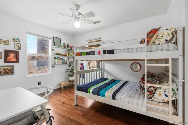 a living room with lots of furniture and decor