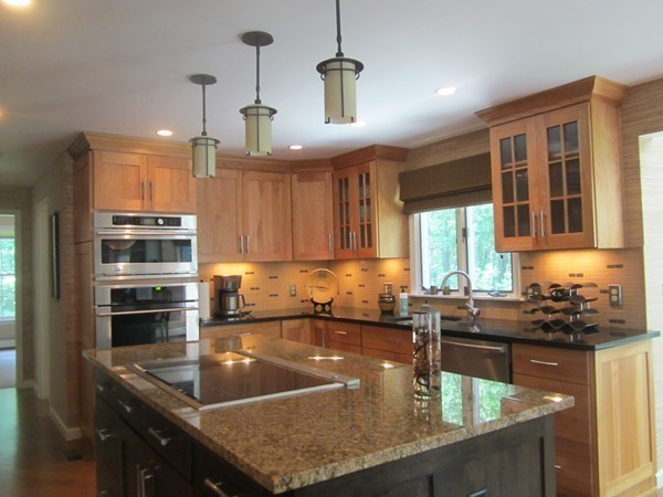 286 Sargent Road Boxborough, MA 01719 - Photo 11 of 29 a kitchen with kitchen island a counter top a stove and a sink