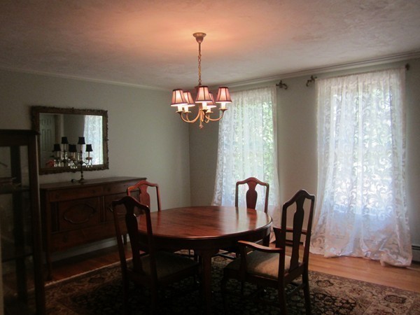 286 Sargent Road Boxborough, MA 01719 - Photo 17 of 29 a view of a dining room with furniture window and wooden floor