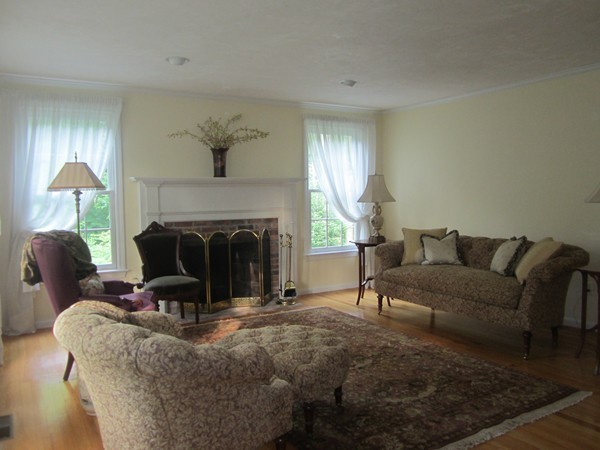 286 Sargent Road Boxborough, MA 01719 - Photo 19 of 29 a living room with furniture and a fireplace