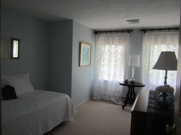 286 Sargent Road Boxborough, MA 01719 - Photo 22 of 29 a bedroom with a bed next to a window