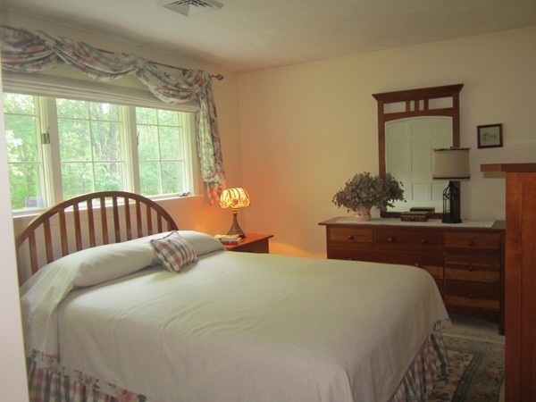 286 Sargent Road Boxborough, MA 01719 - Photo 24 of 29 a bedroom with a bed and a dresser next to a window