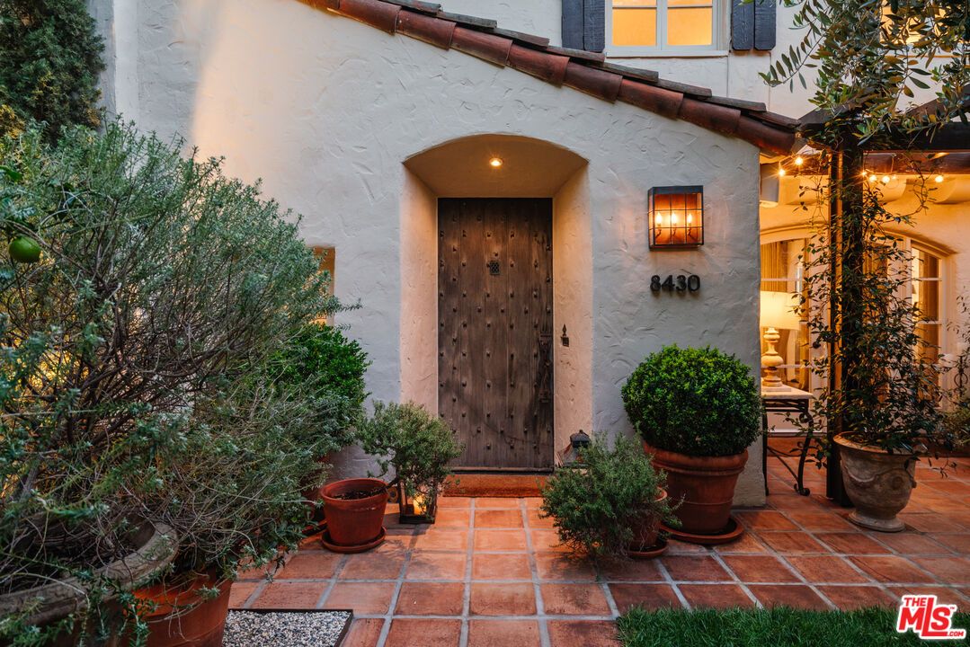8430 Cresthill Road Los Angeles, CA 90069 - Photo 1 of 36 a view of a entryway door front of house