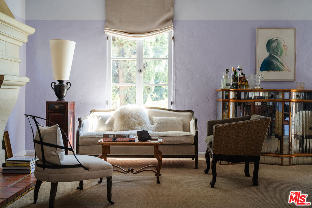 8430 Cresthill Road Los Angeles, CA 90069 - Photo 12 of 36 a living room with furniture and a window