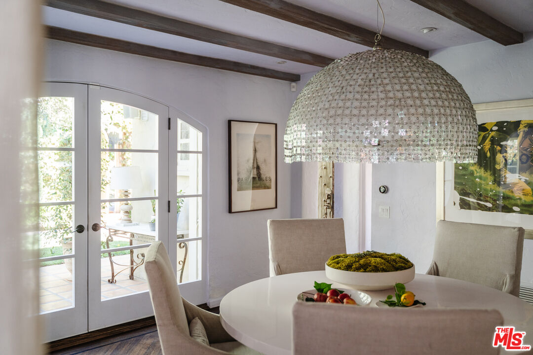 8430 Cresthill Road Los Angeles, CA 90069 - Photo 16 of 36 a living room with furniture and a large window