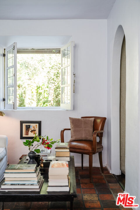 8430 Cresthill Road Los Angeles, CA 90069 - Photo 20 of 36 a living room with furniture and a window
