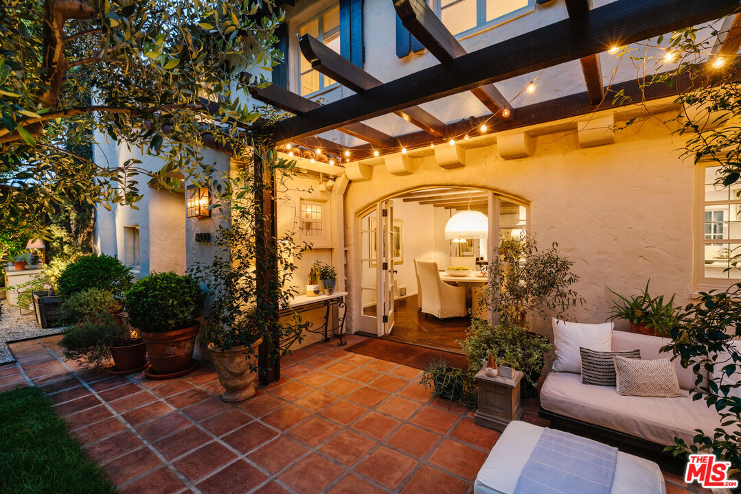 8430 Cresthill Road Los Angeles, CA 90069 - Photo 34 of 36 a view of a porch with furniture
