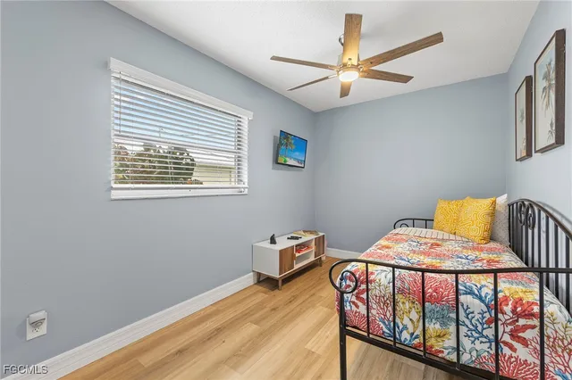 a view of a patio with furniture and a backyard