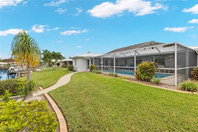 an aerial view of residential building and ocean