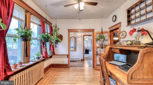 a view of a entryway with furniture and chandelier